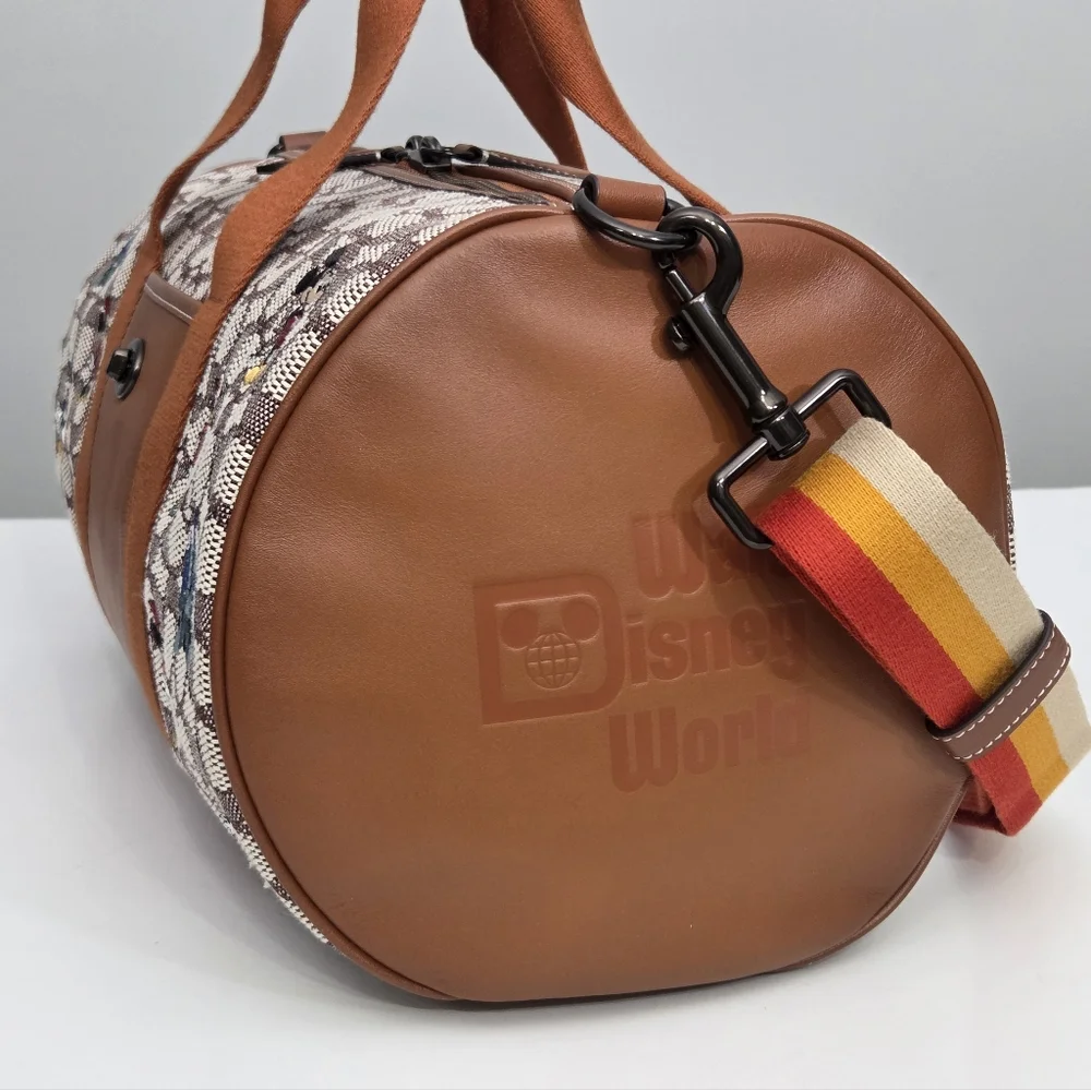 DISNEY X COACH DUFFLE BAG - SIGNATURE TEXTILE JACQUARD MICKEY MOUSE AND FRIENDS